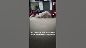Watch: Moment Car Gets Swept Away in Spain