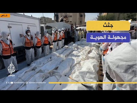 موكب يحمل جثامين شه داء مجهولي الهوية بعدما عجزت عائلاتهم عن التعرف عليهم