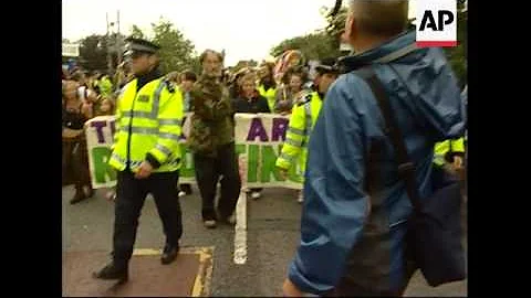 Scuffles between police and climate change protesters