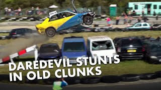 Drivers leap over cars in the 2021 Car Jumping Competition