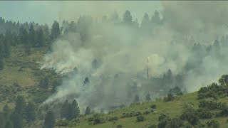 What do fire restrictions do, and how can you prevent wildfires before heading out for a weekend?