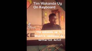 Tim Wakanda Ug with Guitarist Azizi