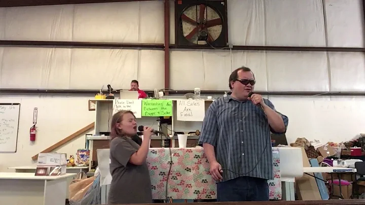 Jamie and Cheyenne Puckett at hwy 9 auction.