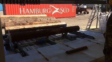 Log loading at REXWOOD mobile sawmill