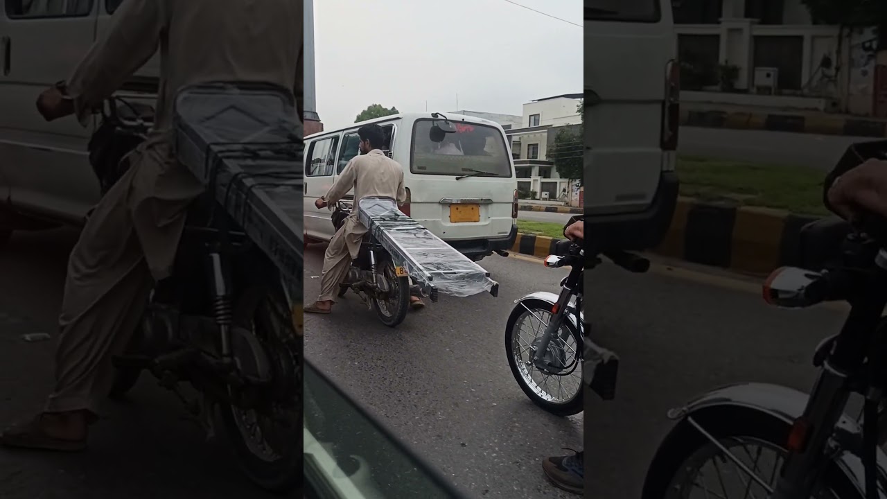 Man takes ladder like this for safety from flooding in Pakistan 😳😲
