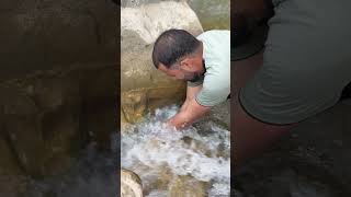 Fishing with hand yesss! Caught a snow trout