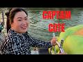 A Female Boat Captain Navigates a Narrow Mekong River with 100 Tons of Rice