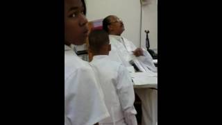 Archbishop Lucius Hall singing He Satisfies