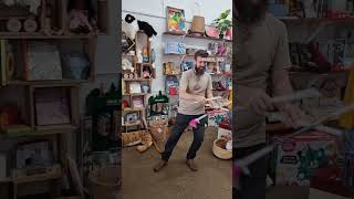 Brad Russell at EarthToys playing with Trick Stix also known as Devil Sticks / Flower sticks