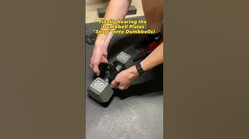 The satisfying “snap” the dumbbell plates make when adding them to your dumbbells