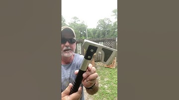 SOG Camp Axe thrown in the board in the Playground