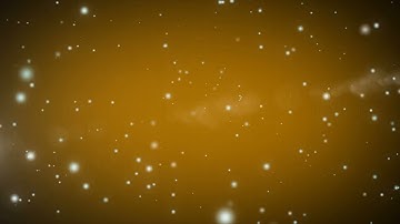 Glitter Golden particles abstract background flickering particles with bokeh effect.