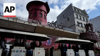 Windmill atop Paris’ famous 19th century Moulin Rouge cabaret falls from roof