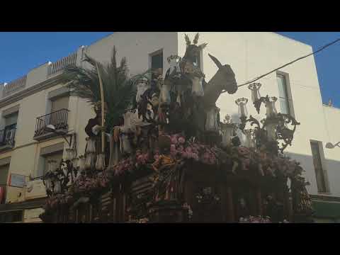 El Misterio de la Sagrada Entrada en Jerusalén por la calle Antonia Díaz el Domingo de Ramos.