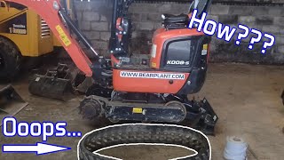 How to remove and fit a rubber track on a Kubota mini digger