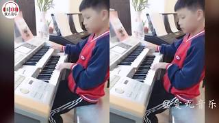 Video thumbnail of "铁血丹心  中国11岁男孩弹奏《射雕英雄传》爆红网络，一人顶整个乐队，太强大了"