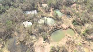 Craters Bomb craters in Laos, in 2016. 80 million unexploded bombs continue to kill and maim here, mainly children. Music excerpt from .At Rest., From YouTubeVideos