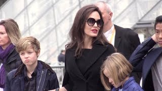 Angelina Jolie brings the all family to the Louvre Museum in Paris