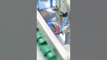 Automated shielded wire harness processing.