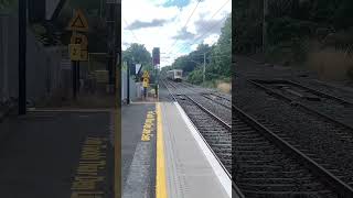 3 car NIR Class 3000 passes through raheny on the enterprise.