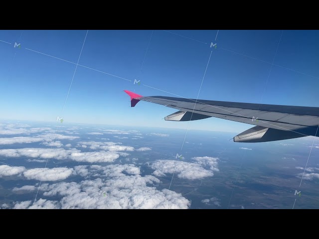 flying on air plane view from the window passenger, turning, flight over sky, inspirational tourism class=