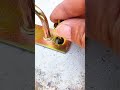 "Metal fastening method hammering bolt onto base plate"