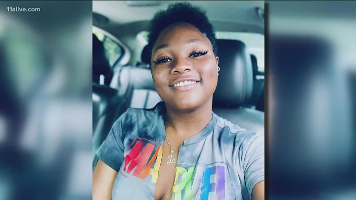 Woman recovering after falling over the edge of I-...