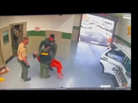 Video shows inmate authorities described as ‘alert’ being carried while he appears unconscious