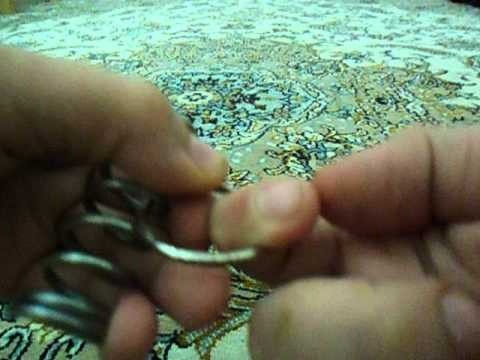 Ring Through Spring Magic Trick