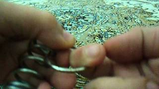 Ring Through Spring Magic Trick