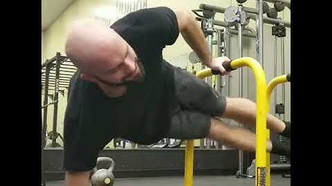 Core exercise using a single EQ bar