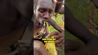 Suku Pedalaman Yang Suka Makan Monyet