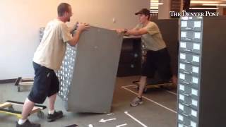 the @denverpost #archive gets moved to its new home... 100-year-old index cards get cabinets precise