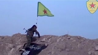 Kurdish fighters 'recapture' parts of Kobani