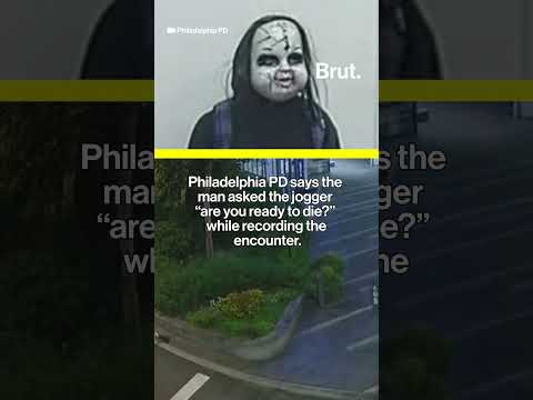Suspect wearing Chucky mask chases woman through a park.
