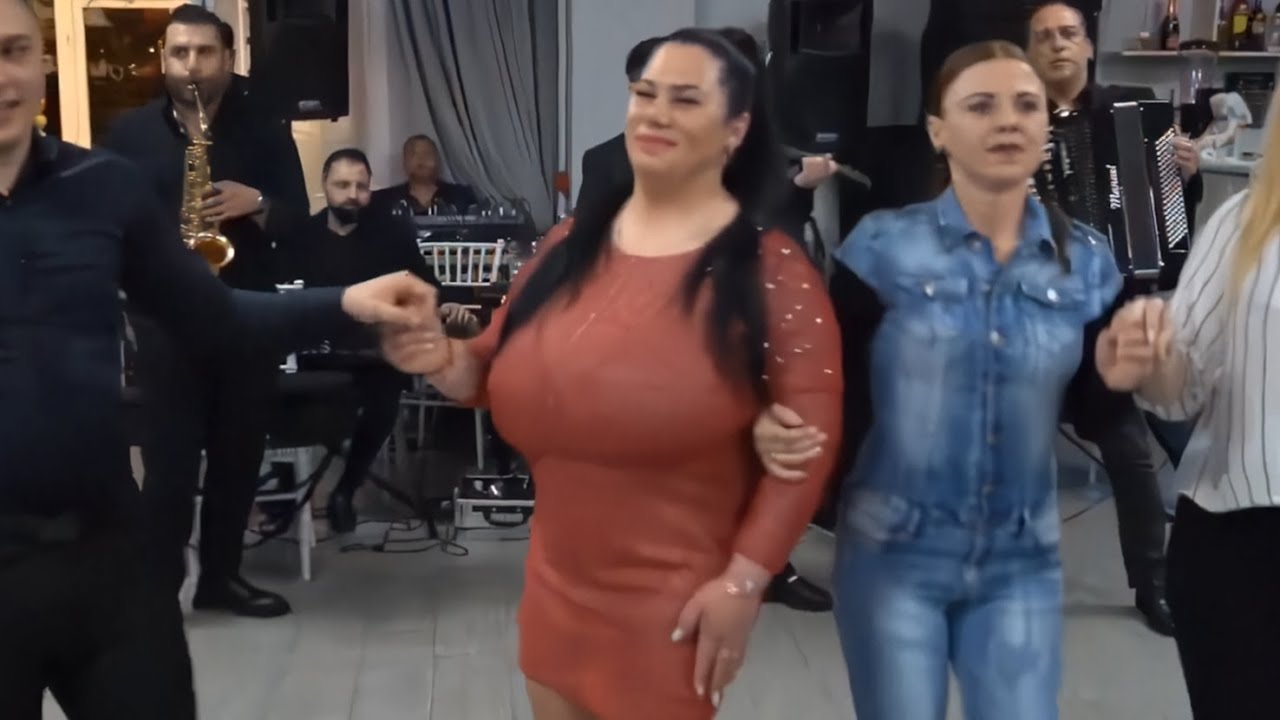 Red dress brunet looking big