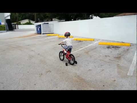 Toren riding his new bike