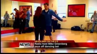ESPN radio host Mike Greenberg pays up on a lost bet