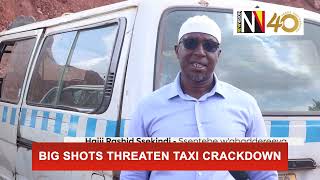 Big shots threaten Taxi crackdown