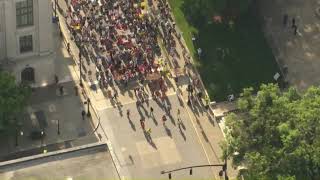 Protesters march in downtown Raleigh for May Day