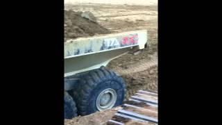 Caterpillar 345C L loading 40tons off road trucks