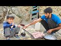 Nomadic nourishment young girl brews tea on fire while omid cooks a local lunch