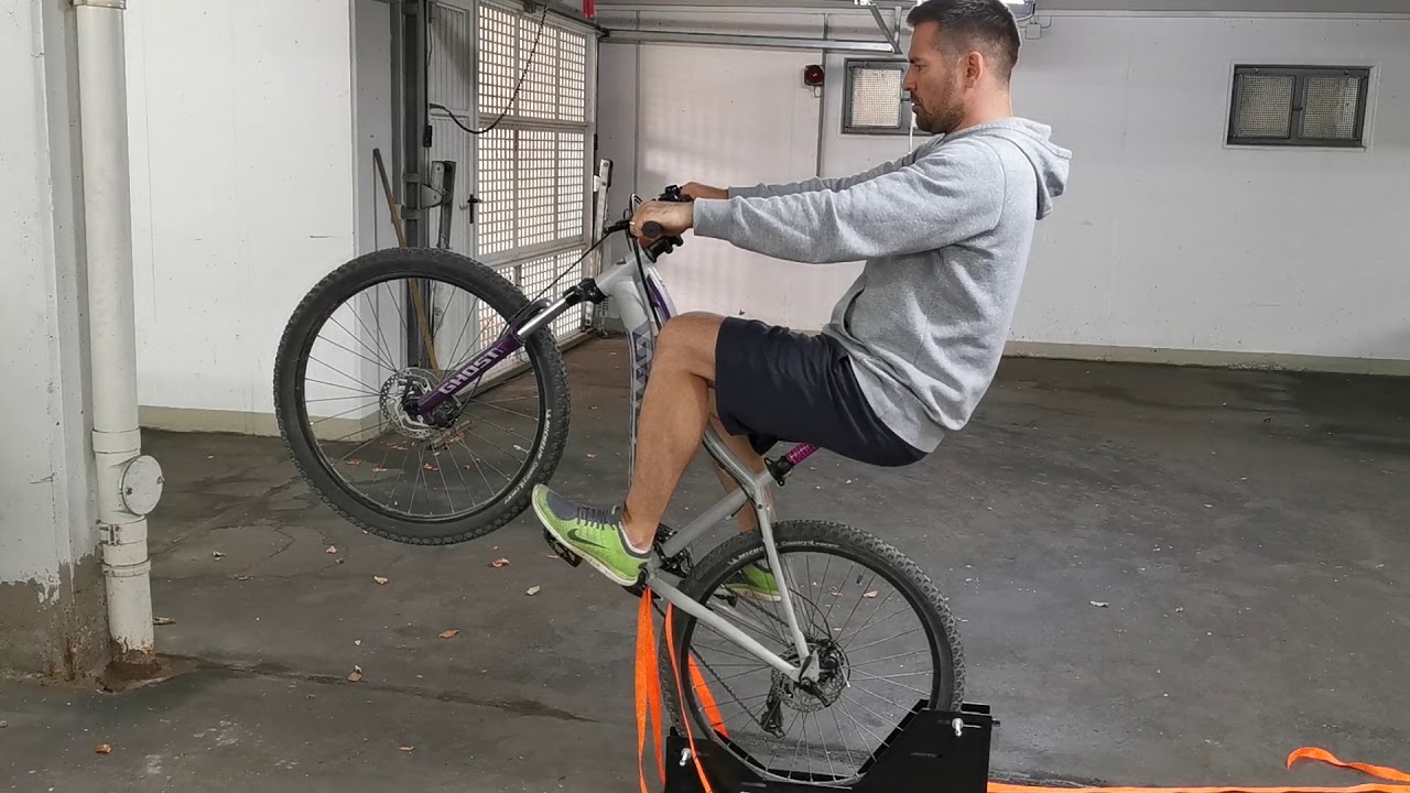 Wheelie Trainer Mtb - YouTube