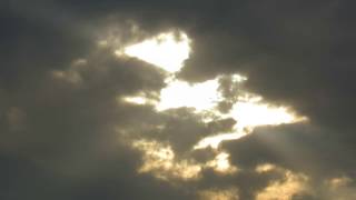 Sun Shining through the Clouds (free to use video)