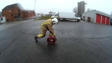 NFRS recruit training - Rolling out 70mm hose