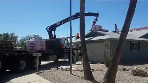 Unloading shingles by crane