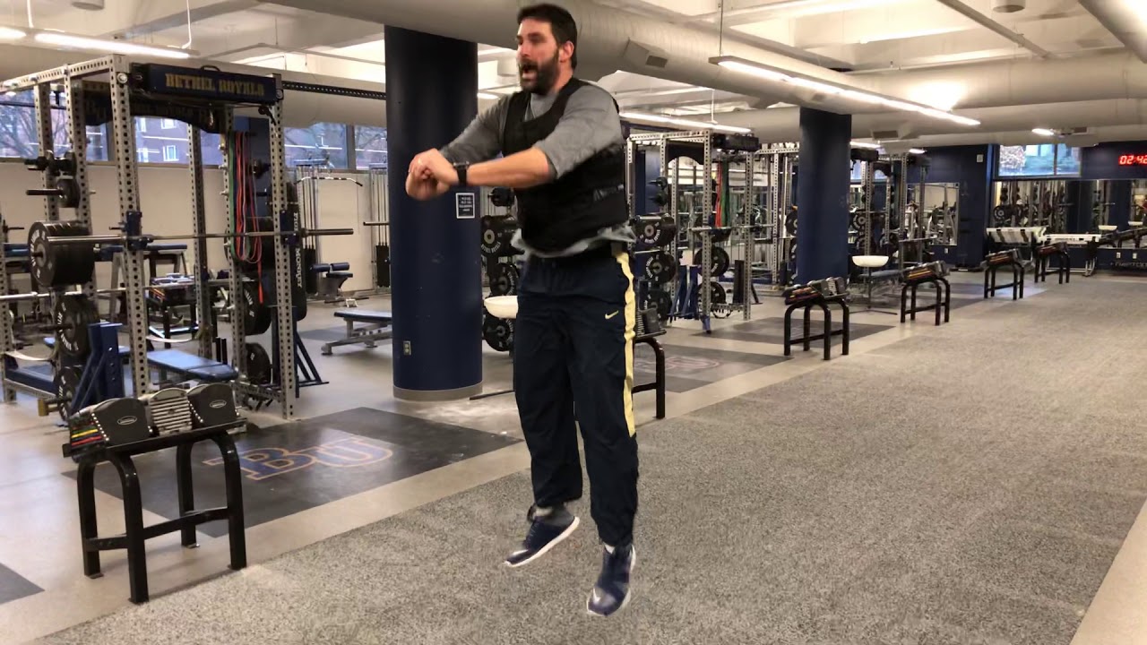 Weight vest squat jump YouTube