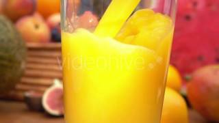 Of Orange Juice Poured Into A Glass Stock Footage - Hive