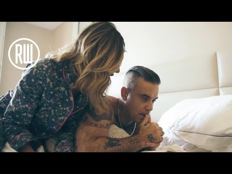 Vidéo: Robbie Williams Et Sa Femme Aida Field Attendent Leur Deuxième Enfant