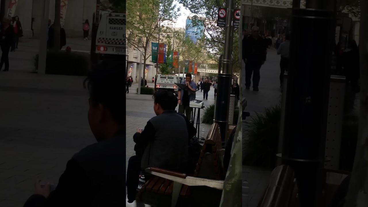 He was busking in the city singing so young n talented